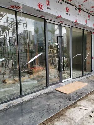 Porta oscillante di sicurezza in alluminio personalizzata con rivestimento a fluorocarbonio