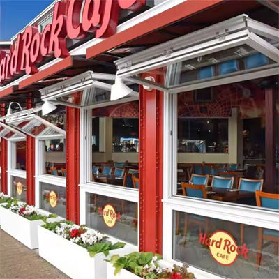 Finestra verticale in alluminio a doppio ripiegamento ad alta efficienza energetica con vetro e telaio personalizzati